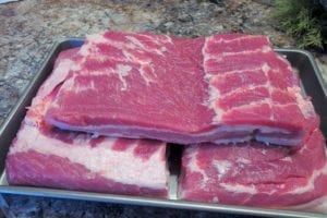 Pork belly cut into three equal pieces