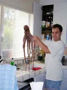 Kevin holding up the octopus
