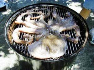 Octopus on the top cooking grate