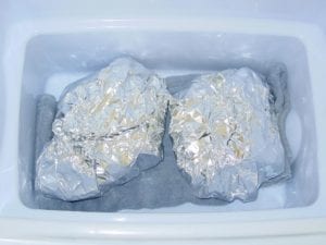 Holding foiled pork butts in cooler