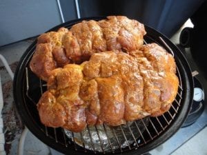 Pork butts go into the WSM