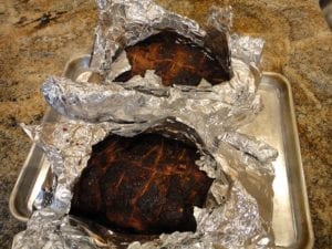 Letting pork butts cool before pulling