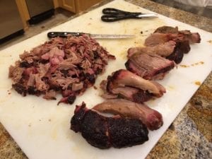Processing pork butt into pulled meat and slices