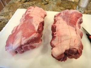 Trimmed and tied pork butts