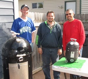 Tony Koury (in red) with friends and WSM cake