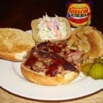 Championship injected pulled pork sandwich and side dishes