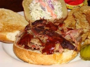 Close-up of championship injected pulled pork sandwich