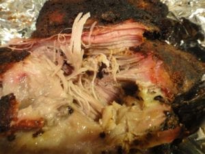 Pulled off a chunk of pork to reveal the smoke ring inside