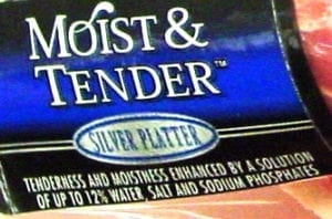 Fine print on label of enhanced pork