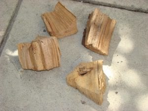 Three chunks of apple wood, one chunk of hickory wood