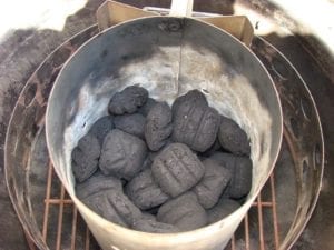 Half full Weber chimney of unlit Kingsford charcoal