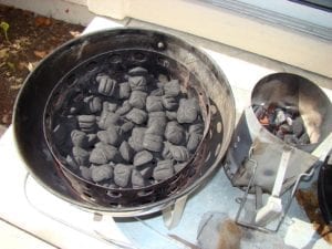 Unlit briquettes in charcoal chamber