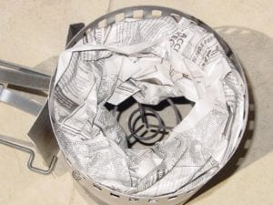 Two newspaper donuts inside chimney starter