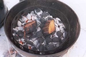 Hot coals and smoke wood