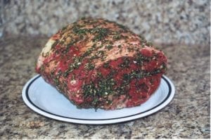 Prime rib roast with herb paste applied