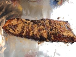Applying brown sugar and honey to spareribs