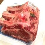 USDA Prime three-rib standing rib roast in packaging