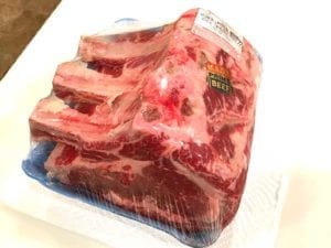 USDA Prime three-rib standing rib roast in packaging