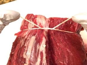 Tying the roast with twine