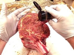 Applying Montreal Steak Rub to USDA Prime rib roast