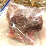 Roast wrapped in plastic wrap and placed in Ziploc bag