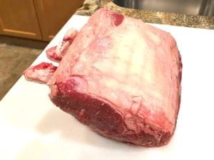 Rib roast unwrapped, fat side up