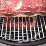 Peek at short ribs on the bottom cooking grate