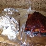 Wrapping short ribs in aluminum foil