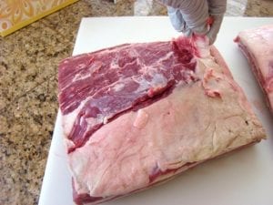 Removing fat cap and silverskin from short ribs