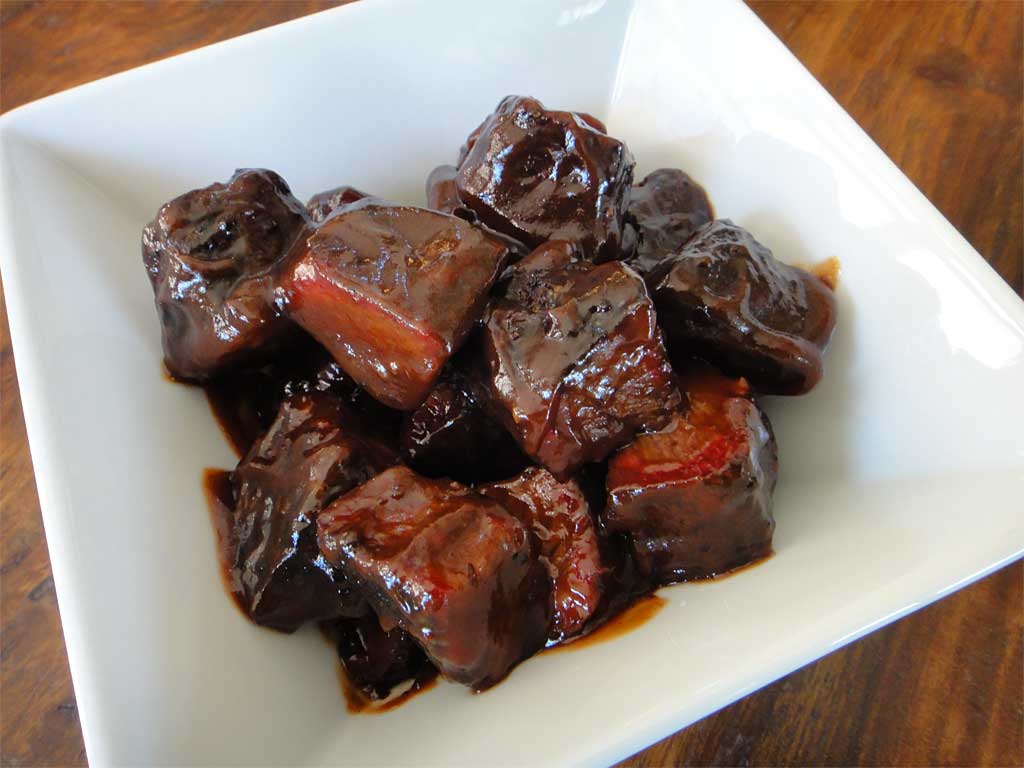 Short ribs cut into cubes and sauced