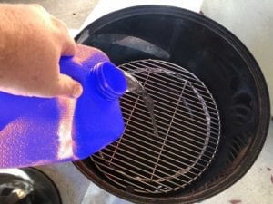 Adding water to the water pan