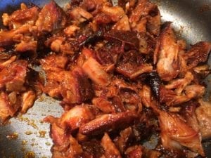Close-up of rib meat in sauce