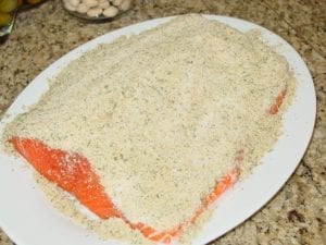 Brown sugar rub applied to salmon