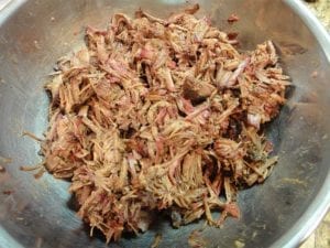 Shredded beef mixed with barbecue sauce and defatted cooking juices