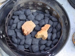One Weber chimney of unlit Kingsford and 2 cherry wood chunks