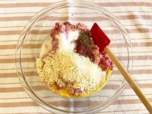 Meatloaf ingredients in mixing bowl