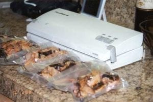 Vacuum packing pork butt with a Foodsaver