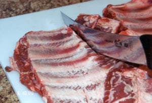Cutting below the sternum (breast bone)