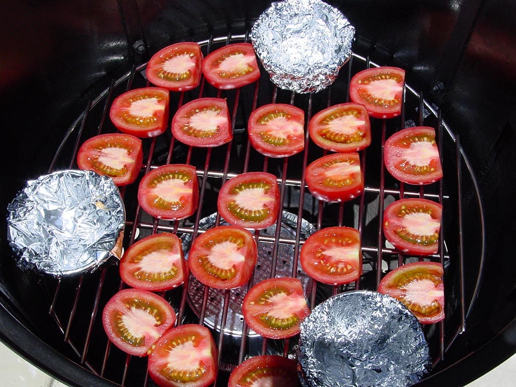 Tomatoes on bottom cooking grate