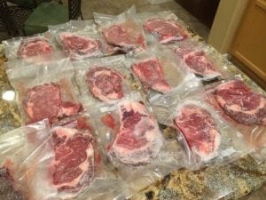 Vacuum packing slices of rib roast