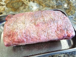 Standing rib roast, seasoned with kosher salt and pepper