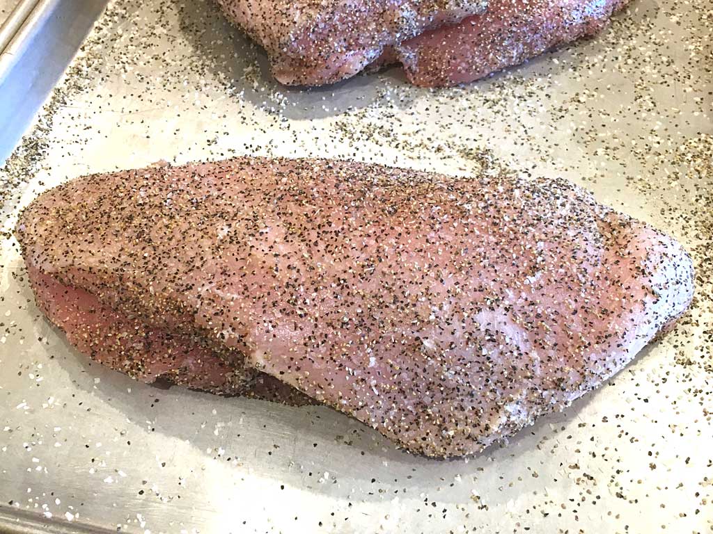 Close-up of rubbed turkey breast showing how much rub was applied