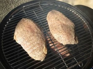 Four rubbed turkey breasts go into the WSM