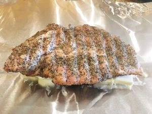 Turkey breast placed former skin-side down on top of butter pats