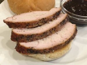 Close-up of turkey breast sliced on bun