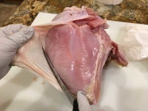 Removing skin from whole, bone-in turkey breast