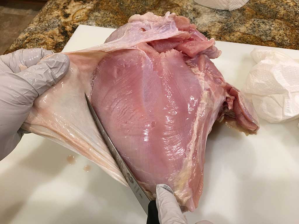 Removing skin from whole, bone-in turkey breast