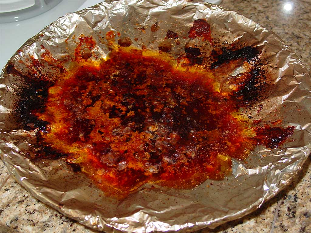 Drippings in foil-lined water pan