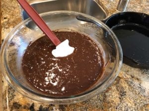 Prepared brownie batter in mixing bowl