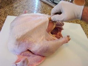 Loosening skin over breast